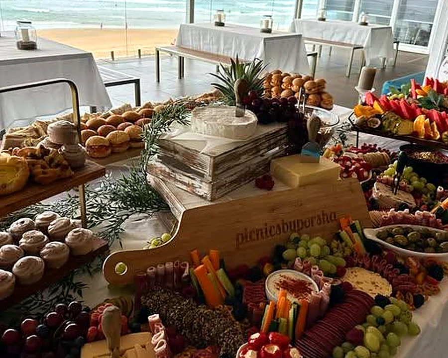 A grazing spread with fruit, cheeses and chocolate-dipped strawberries